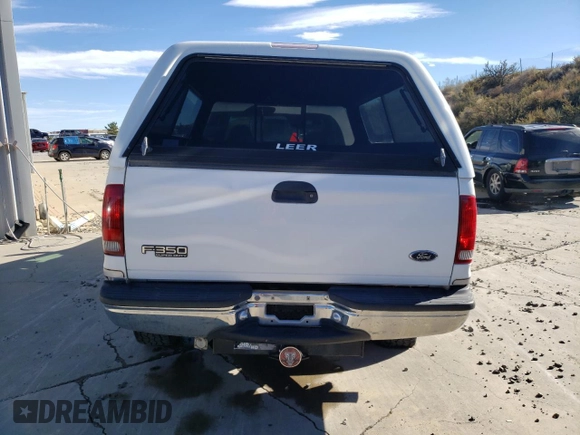 2000 Ford F-350 XL with VIN 1FTSW31F5YEA50810, listed as a Copart auction lot 83274144 with 147,370 mi miles and Salvage Title. Bid and sale history available at DreamBid. Image 6.