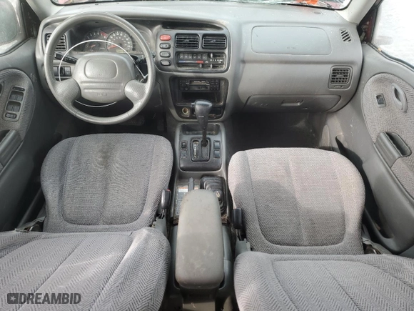 1999 Suzuki Grand Vitara JLX with VIN JS3TD62V6X4108950, listed as a Copart auction lot 46468705 with 215,541 mi miles and Salvage Title. Bid and sale history available at carsss.com. Image 8.