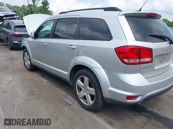 2012 Dodge Journey SXT z VIN 3C4PDCBGXCT324756, wystawiony jako IAAI lot #42422533 z przebiegiem 241 934 mil mil oraz . Historia ofert i sprzedaży dostępna na DreamBid. Obrazek 3.