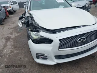 2014 Infiniti Q50 Premium z VIN JN1BV7AP4EM676324, wystawiony jako IAAI lot #42167934 z przebiegiem 114 670 mil mil oraz . Historia ofert i sprzedaży dostępna na DreamBid. Obrazek 6.