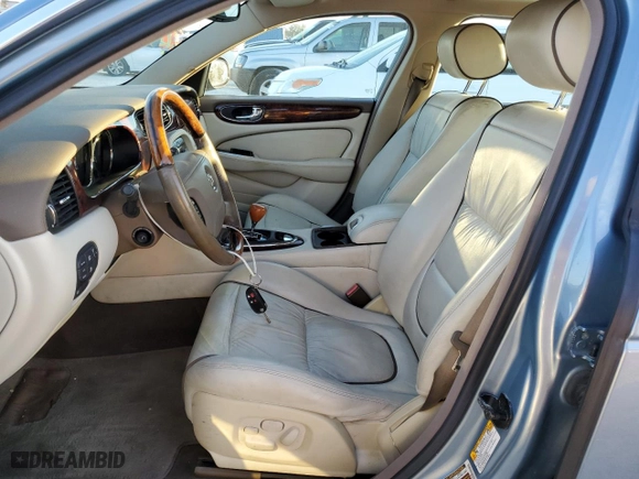 2005 Jaguar XJ VDP with VIN SAJWA82C65SG45247, listed as a Copart auction lot 77950594 with NaN miles and Salvage Title. Bid and sale history available at carsss.com. Image 7.