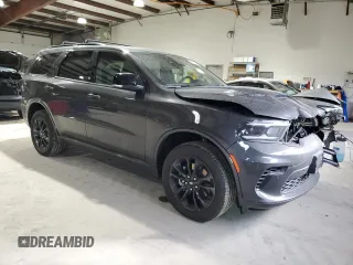 2025 Dodge Durango GT Plus with VIN 1C4RDJDG5SC506983, listed as a Copart auction lot 82427384 with 1,404 mi miles and Salvage title. Bid and sale history available at DreamBid. Image 4.