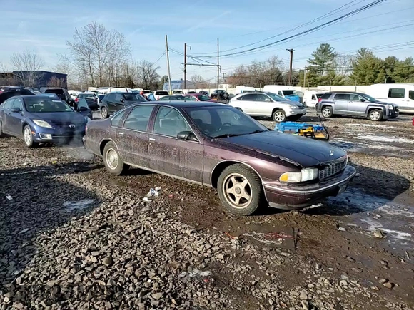 1996 Chevrolet Caprice 1SA Special Value z VIN 1G1BL52W3TR156945, wystawiony jako Copart lot #86470784 z przebiegiem 166 584 mil mil oraz Szkoda całkowita • Salvage title. Historia ofert i sprzedaży dostępna na DreamBid. Obrazek 11.