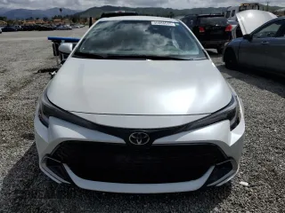 2023 Toyota Corolla Hatchback XSE with VIN JTNC4MBE4P3211451, listed as a Copart auction lot 50886045 with 16,344 mi miles and Salvage Title. Bid and sale history available at carsss.com. Image 5.