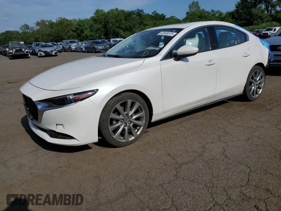 2020 Mazda 3 Premium with VIN JM1BPAEM8L1169106, listed as a Copart auction lot 63565875 with 61,209 mi miles and Salvage title. Bid and sale history available at DreamBid. Image 1.