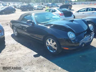 2002 Ford Thunderbird w/Hardtop Premium with VIN 1FAHP60AX2Y116200, listed as a IAAI auction lot 40129557 with 88,991 mi miles. Bid and sale history available at carsss.com. Image 13.