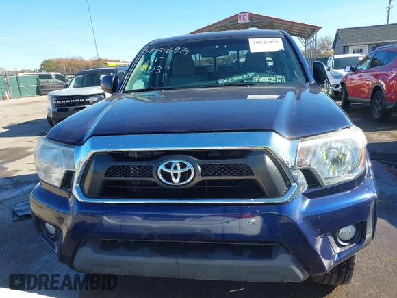 2013 Toyota Tacoma with VIN 3TMMU4FN4DM052928, listed as a IAAI auction lot 40846879 with 113,928 mi miles. Bid and sale history available at carsss.com. Image 12.