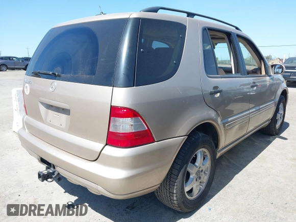 2002 Mercedes-Benz M 320/430/500 z VIN 4JGAB54E52A298975, wystawiony jako IAAI lot #41985135 z przebiegiem 278 592 mil mil oraz . Historia ofert i sprzedaży dostępna na DreamBid. Obrazek 4.