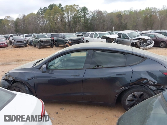 2024 Tesla Model Y with VIN 7SAYGDED3RA303113, listed as a IAAI auction lot 41915760 with 12,917 mi miles and . Bid and sale history available at DreamBid. Image 13.