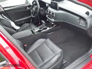 2019 Kia Stinger with VIN KNAE15LA7K6063792, listed as a IAAI auction lot 41490932 with 19,806 mi miles. Bid and sale history available at carsss.com. Image 5.