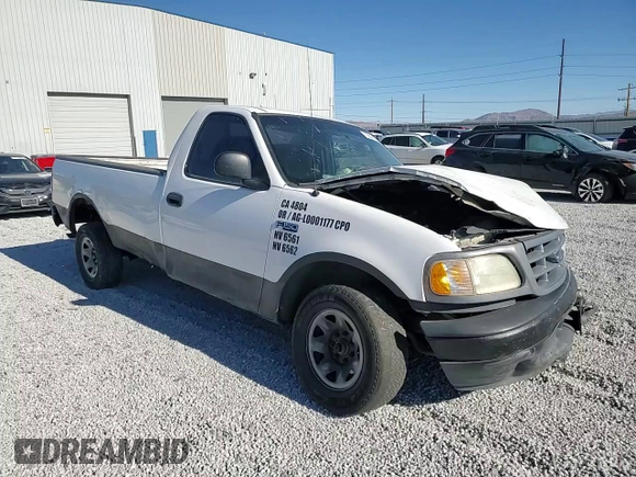 2000 Ford F-150 XL with VIN 2FTPF17Z5YCA99717, listed as a Copart auction lot 70658194 with Not provided miles and Salvage title. Bid and sale history available at DreamBid. Image 11.