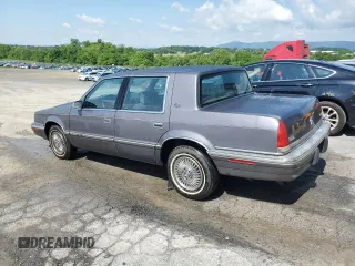 1993 Chrysler New Yorker z VIN 1C3XC66R8PD205488, wystawiony jako Copart lot #59097875 z przebiegiem 70 593 mil mil oraz Czysty tytuł • Clean title. Historia ofert i sprzedaży dostępna na DreamBid. Obrazek 2.