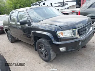 2011 Honda Ridgeline RT z VIN 5FPYK1F22BB451857, wystawiony jako IAAI lot #42253277 z przebiegiem 109 720 mil mil oraz . Historia ofert i sprzedaży dostępna na DreamBid. Obrazek 1.