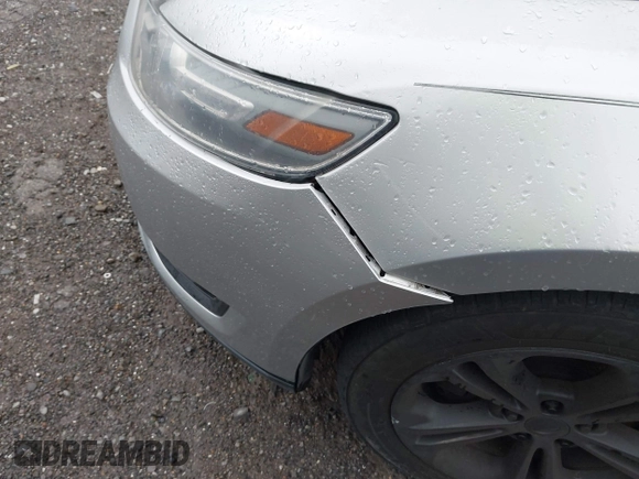 2015 Ford Taurus SEL with VIN 1FAHP2E95FG209483, listed as a IAAI auction lot 41920846 with 138,673 mi miles and . Bid and sale history available at DreamBid. Image 6.