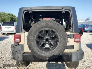 2018 Jeep Wrangler JK Unlimited Sport S with VIN 1C4BJWDG0JL912451, listed as a Copart auction lot 68477194 with 0 mi miles and Non Repairable. Bid and sale history available at carsss.com. Image 6.