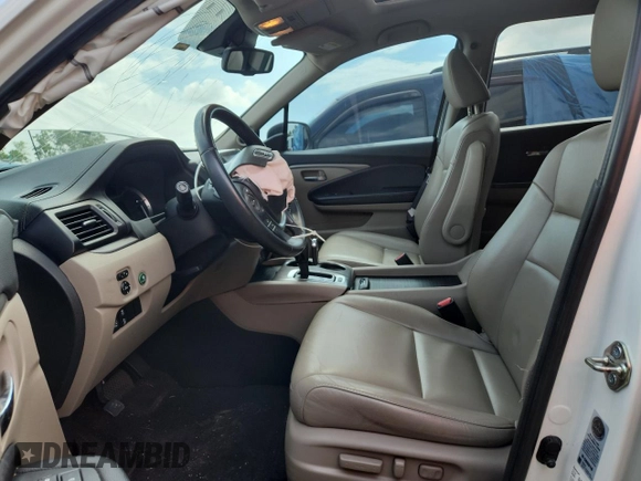 2018 Honda Pilot EX-L with VIN 5FNYF6H62JB043318, listed as a Copart auction lot 57853335 with 57,354 mi miles and Salvage title. Bid and sale history available at DreamBid. Image 7.
