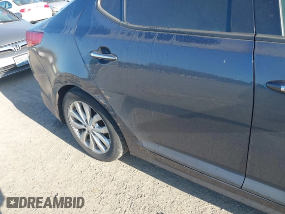 2015 Kia Optima EX with VIN 5XXGN4A77FG368704, listed as a IAAI auction lot 42174674 with 128,963 mi miles. Bid and sale history available at carsss.com. Image 6.