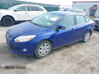 2012 Ford Focus SE with VIN 1FAHP3F21CL342199, listed as a IAAI auction lot 42119170 with 185,307 mi miles and . Bid and sale history available at carsss.com. Image 2.