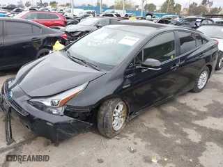 2019 Toyota Prius L Eco with VIN JTDKARFU6K3074058, listed as a IAAI auction lot 41741499 with 70,834 mi miles. Bid and sale history available at carsss.com. Image 2.