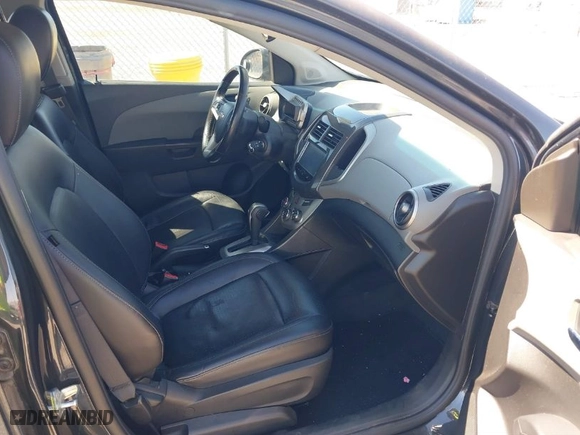 2015 Chevrolet Sonic LTZ with VIN 1G1JE5SB7F4103055, listed as a IAAI auction lot 41829359 with NaN miles. Bid and sale history available at carsss.com. Image 5.