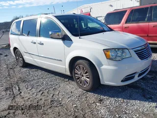 2011 Chrysler Town & Country Touring-L with VIN 2A4RR8DG5BR784309, listed as a IAAI auction lot 41595083 with 242,099 mi miles. Bid and sale history available at carsss.com. Image 1.