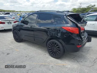 2010 Hyundai Tucson GLS with VIN KM8JU3AC2AU079129, listed as a Copart auction lot 54312875 with 116,659 mi miles and Salvage Title. Bid and sale history available at DreamBid. Image 2.