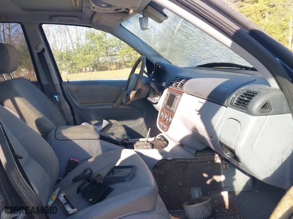 2003 Mercedes-Benz M-Class 3.7L with VIN 4JGAB57E23A450868, listed as a IAAI auction lot 41983681 with 125,468 mi miles. Bid and sale history available at carsss.com. Image 5.