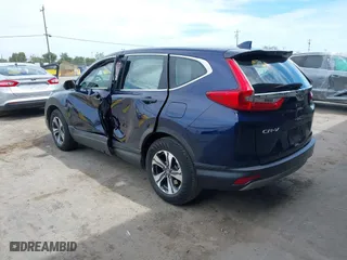 2017 Honda CR-V LX with VIN 7FARW5H39HE015356, listed as a IAAI auction lot 42028467 with 149,785 mi miles. Bid and sale history available at carsss.com. Image 3.