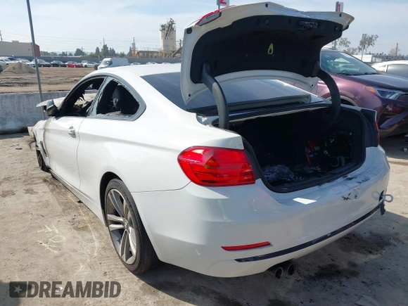 2015 BMW 4 Series 428i with VIN WBA3N7C53FK222492, listed as a IAAI auction lot 41612989 with Not Provided miles. Bid and sale history available at carsss.com. Image 3.