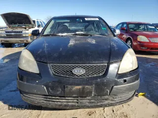 2009 Kia Rio LX with VIN KNADE243796516902, listed as a Copart auction lot 86567394 with 304,684 mi miles and Salvage Title. Bid and sale history available at carsss.com. Image 5.