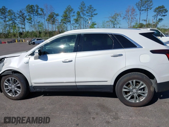 2021 Cadillac XT5 FWD Premium Luxury with VIN 1GYKNCR48MZ234688, listed as a IAAI auction lot 41827211 with 36,797 mi miles and . Bid and sale history available at DreamBid. Image 14.