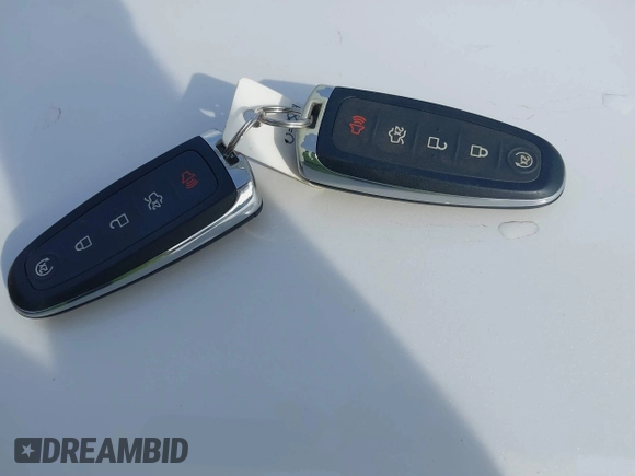 2015 Ford Escape Titanium with VIN 1FMCU9J98FUC76491, listed as a IAAI auction lot 41790638 with 158,196 mi miles and . Bid and sale history available at DreamBid. Image 11.