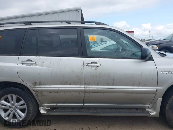 2006 Toyota Highlander z VIN JTEDW21A160001634, wystawiony jako IAAI lot #41899340 z przebiegiem Nie podano mil oraz . Historia ofert i sprzedaży dostępna na DreamBid. Obrazek 13.