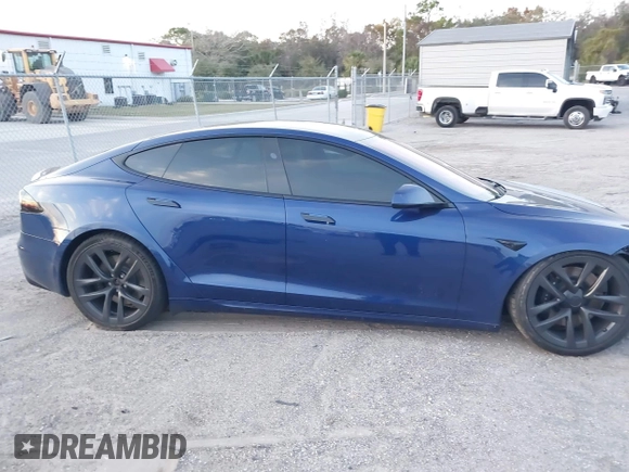 2023 Tesla Model S with VIN 5YJSA1E53PF518986, listed as a IAAI auction lot 41223046 with 22,204 mi miles and . Bid and sale history available at DreamBid. Image 14.