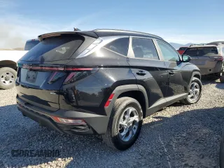 2022 Hyundai Tucson SEL with VIN 5NMJBCAE5NH030189, listed as a Copart auction lot 75327374 with 33,864 mi miles and Salvage Title. Bid and sale history available at DreamBid. Image 3.