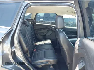 2017 Ford Escape Titanium with VIN 1FMCU0J97HUE07747, listed as a IAAI auction lot 41977788 with 104,560 mi miles. Bid and sale history available at carsss.com. Image 8.