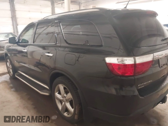 2013 Dodge Durango Citadel with VIN 1C4SDJET9DC661861, listed as a IAAI auction lot 42597126 with 187,631 mi miles and . Bid and sale history available at DreamBid. Image 3.
