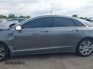 2014 Lincoln MKZ z VIN 3LN6L2GK3ER807586, wystawiony jako IAAI lot #42426125 z przebiegiem 198 281 mil mil oraz . Historia ofert i sprzedaży dostępna na DreamBid. Obrazek 13.