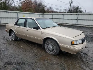 1994 Oldsmobile Cutlass Ciera S z VIN 1G3AG55M0R6376703, wystawiony jako Copart lot #81943994 z przebiegiem 107 168 mil mil oraz Szkody całkowita. Historia ofert i sprzedaży dostępna na DreamBid. Obrazek 4.