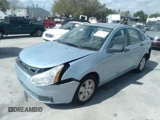 2008 Ford Focus S with VIN 1FAHP34N68W149713, listed as a IAAI auction lot 35985907 with 139,029 mi miles. Bid and sale history available at carsss.com. Image 2.
