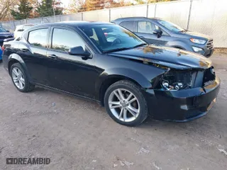 2013 Dodge Avenger SE V6 with VIN 1C3CDZAG9DN576474, listed as a IAAI auction lot 40798702 with 154,532 mi miles. Bid and sale history available at carsss.com. Image 1.