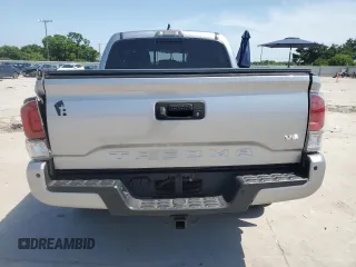 2021 Toyota Tacoma SR с VIN 3TMCZ5AN1MM440032, выставлен на аукционе Copart как лот 56972895 с пробегом 41 029 миль миль и Списание • Salvage title. История ставок и продаж доступна на DreamBid. Изображение 6.