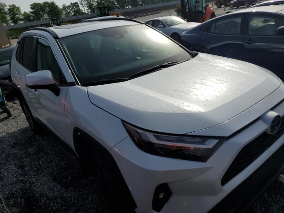 2024 Toyota RAV4 Hybrid XLE Premium with VIN 4T3B6RFV1RU174487, listed as a Copart auction lot 57208645 with 9,911 mi miles and Salvage title. Bid and sale history available at DreamBid. Image 4.