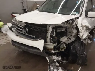 2014 Honda Pilot EX-L with VIN 5FNYF3H55EB001897, listed as a IAAI auction lot 41236308 with 159,681 mi miles. Bid and sale history available at carsss.com. Image 6.
