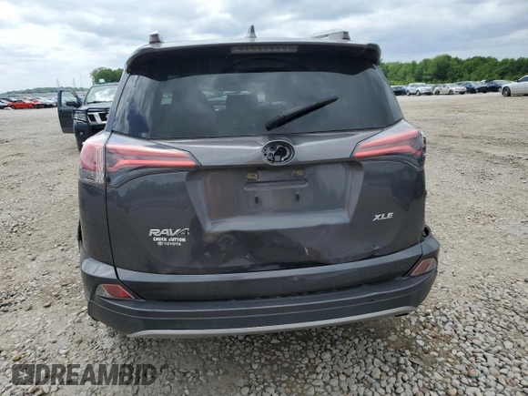 2018 Toyota RAV4 XLE with VIN JTMWFREV3JJ168194, listed as a Copart auction lot 56937675 with 82,589 mi miles and Salvage title. Bid and sale history available at DreamBid. Image 6.