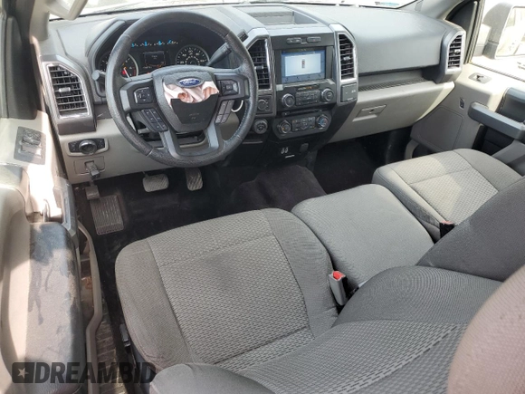 2016 Ford F-150 XLT with VIN 1FTFX1EG2GFB17717, listed as a Copart auction lot 55575825 with 122,867 mi miles and Salvage title. Bid and sale history available at DreamBid. Image 8.