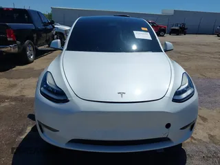 2020 Tesla Model Y Long Range z VIN 5YJYGDEE0LF035248, wystawiony jako IAAI lot #42162191 z przebiegiem 115 533 mil mil oraz . Historia ofert i sprzedaży dostępna na DreamBid. Obrazek 13.