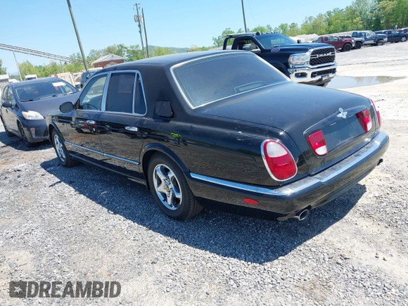 1999 Bentley Arnage z VIN SCBLB51E1XCX01401, wystawiony jako IAAI lot #42133144 z przebiegiem 29 699 mil mil oraz . Historia ofert i sprzedaży dostępna na DreamBid. Obrazek 3.
