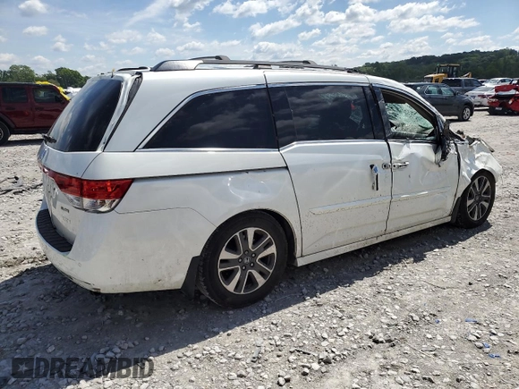 2014 Honda Odyssey Touring with VIN 5FNRL5H98EB053486, listed as a Copart auction lot 58004225 with 201,526 mi miles and Salvage title. Bid and sale history available at DreamBid. Image 3.