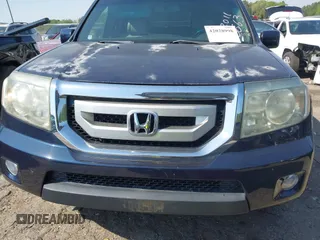 2011 Honda Pilot EX-L with VIN 5FNYF4H53BB100669, listed as a IAAI auction lot 42028998 with 137,215 mi miles. Bid and sale history available at carsss.com. Image 12.